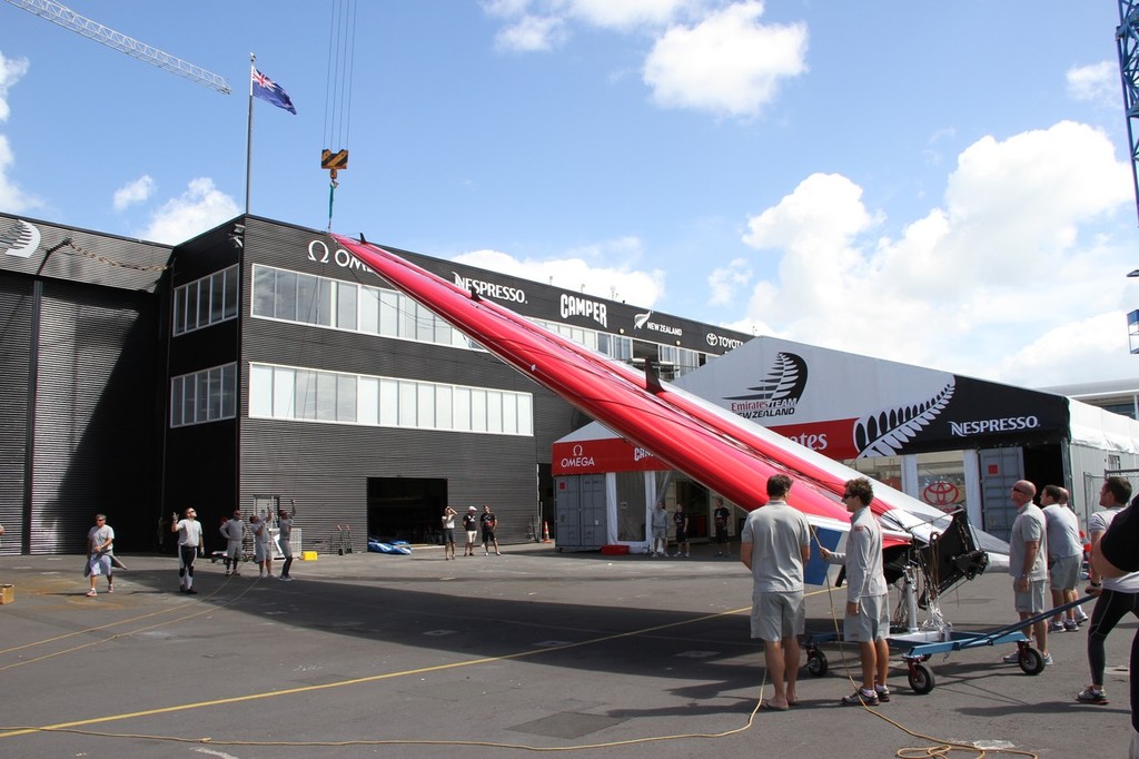 Wingsail starts the hoist - Prada AC45 launch - 16 January 2012, Auckland © Richard Gladwell www.photosport.co.nz
